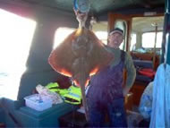 Skipper Dave Bobbett with a Conger Eel
